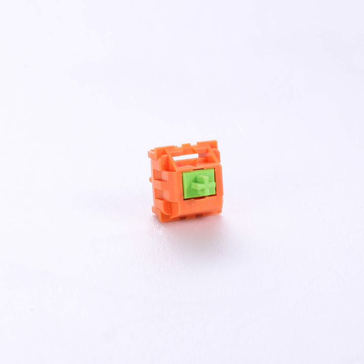 Vibrant Aflion Carrot keyboard switches showcasing distinctive orange housings, ideal for a pop of color in your typing experience