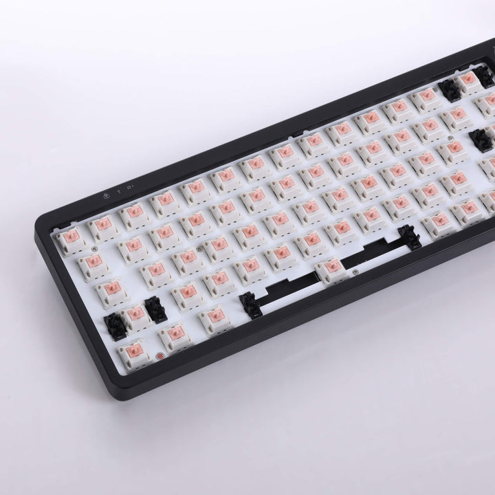 Black barebones keyboard dawning 67 Aflion Panda switches and a versatile adjustable knob, offering a minimalist and functional design for customized typing and control.