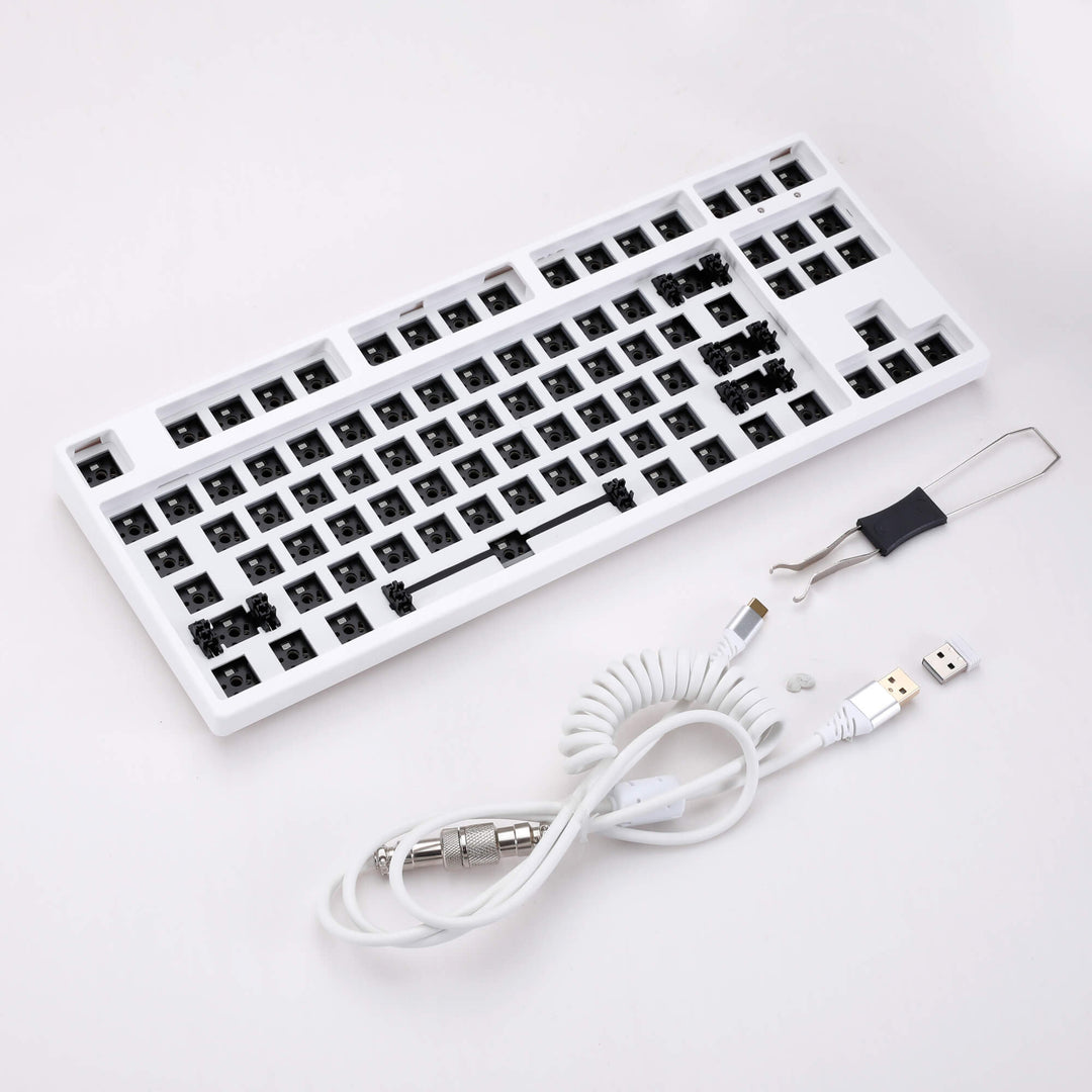 White barebones keyboard featuring 87 keys, providing a sleek and compact typing solution with essential functionality.