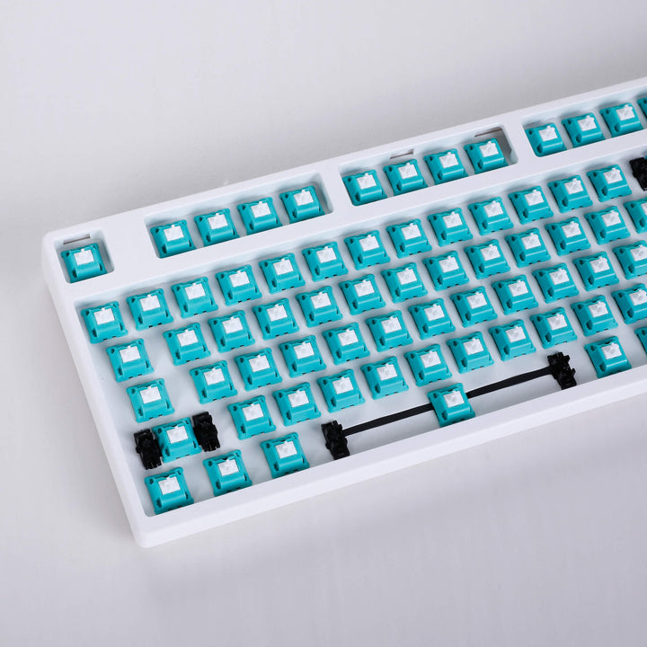 White barebones keyboard featuring 87 Aflion Tropical Water switches, providing a sleek and compact typing solution with essential functionality.
