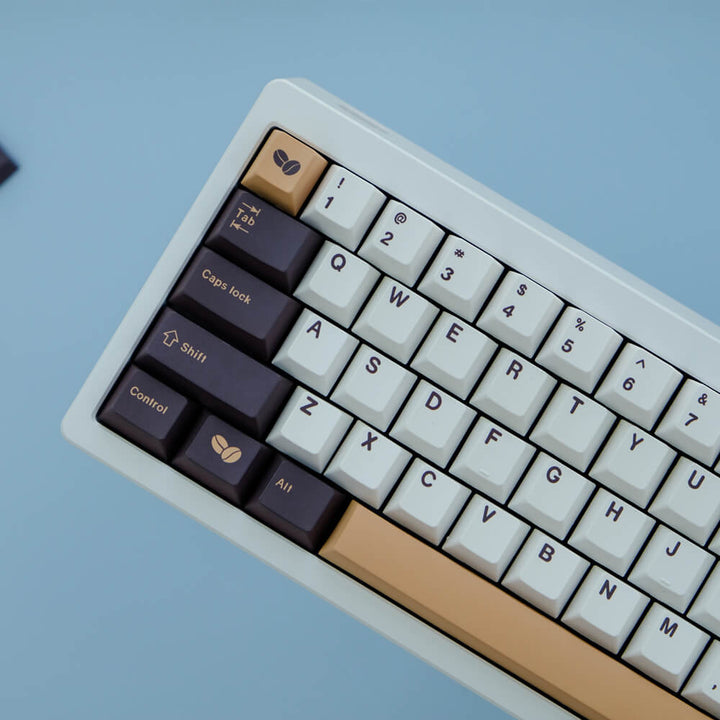 Coffee-themed custom keycap set, featuring rich brown and cream-colored keycaps with coffee-related designs, perfect for adding a cozy and aromatic vibe to your keyboard.