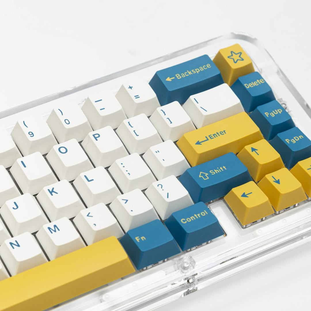 Merlin keycap set, characterized by captivating turquoise and yellow colors, offering a unique and visually striking aesthetic for your keyboard.