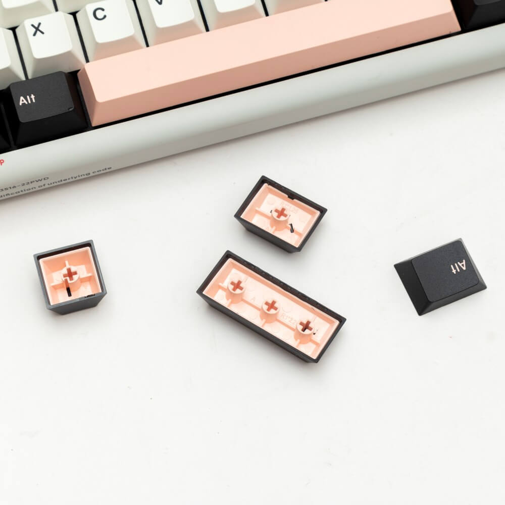 Olivia keycap set, featuring a harmonious blend of brown and pink colors in an elegant and refined design, showcasing intricate details for a tasteful and sophisticated look on your keyboard.