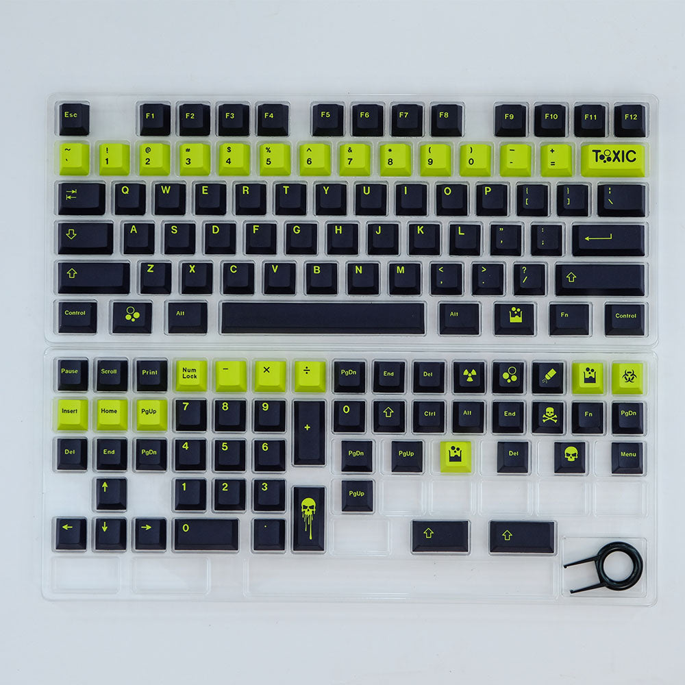 Poison keycap set shown in its packaging, featuring striking lime green and black color scheme with captivating designs, adding an edgy and bold aesthetic to your keyboard.