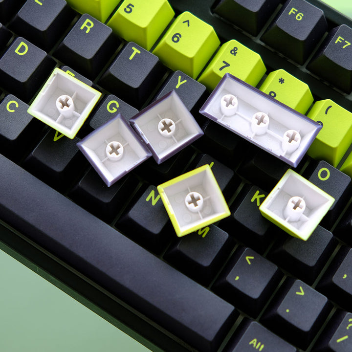 Poison keycap set, featuring striking lime green and black color scheme with captivating designs, adding an edgy and bold aesthetic to your keyboard.